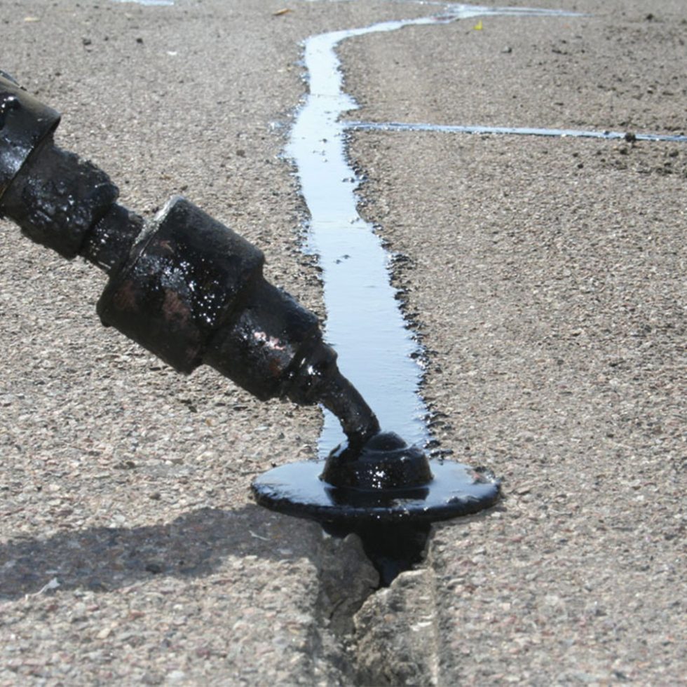 Hot Tar Crack Filling - M Wells Asphalt | Akron, OH